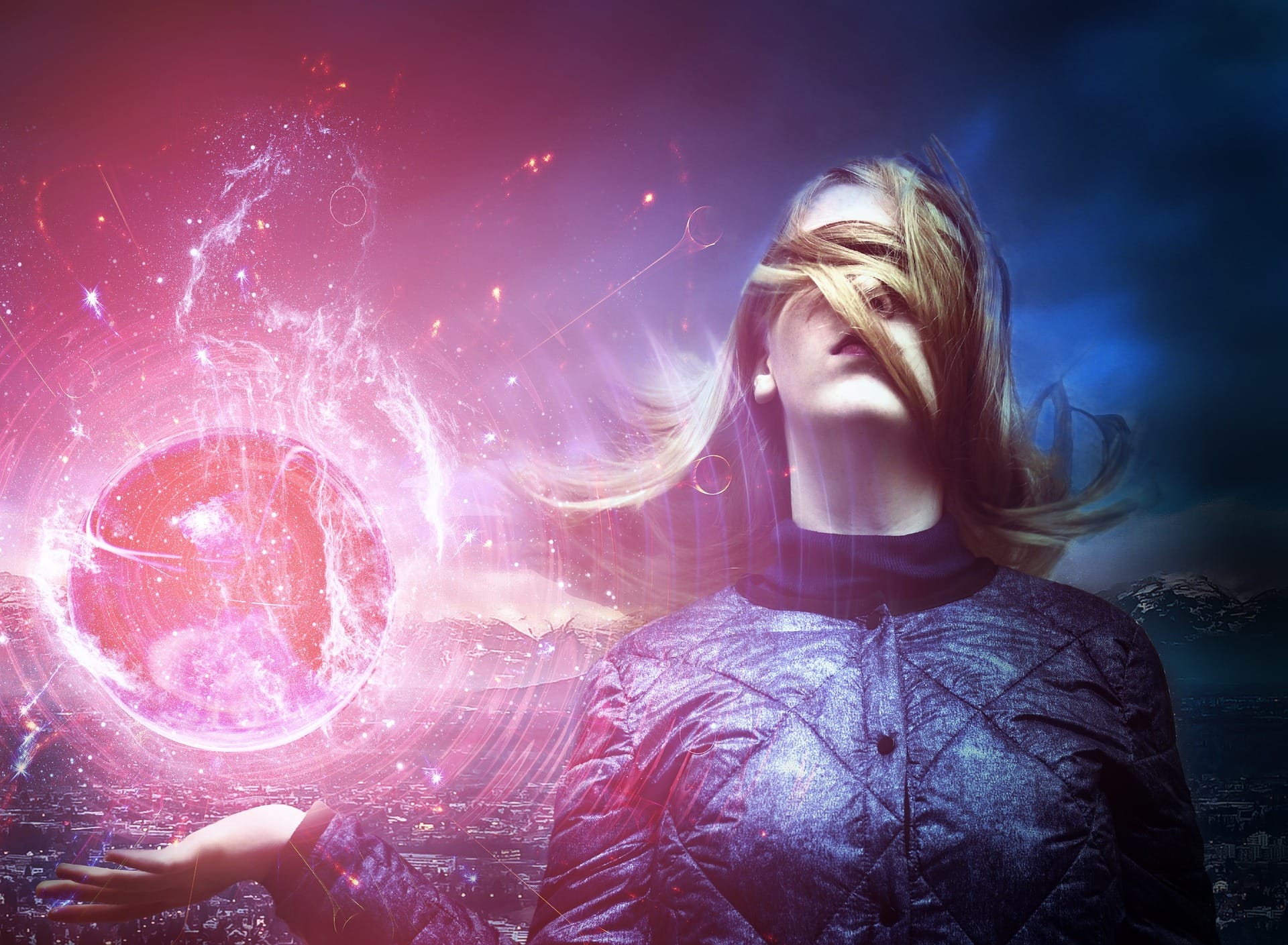 Girl with hair across her eyes in blue jacket. Mystic colorful orb floating over her palm.